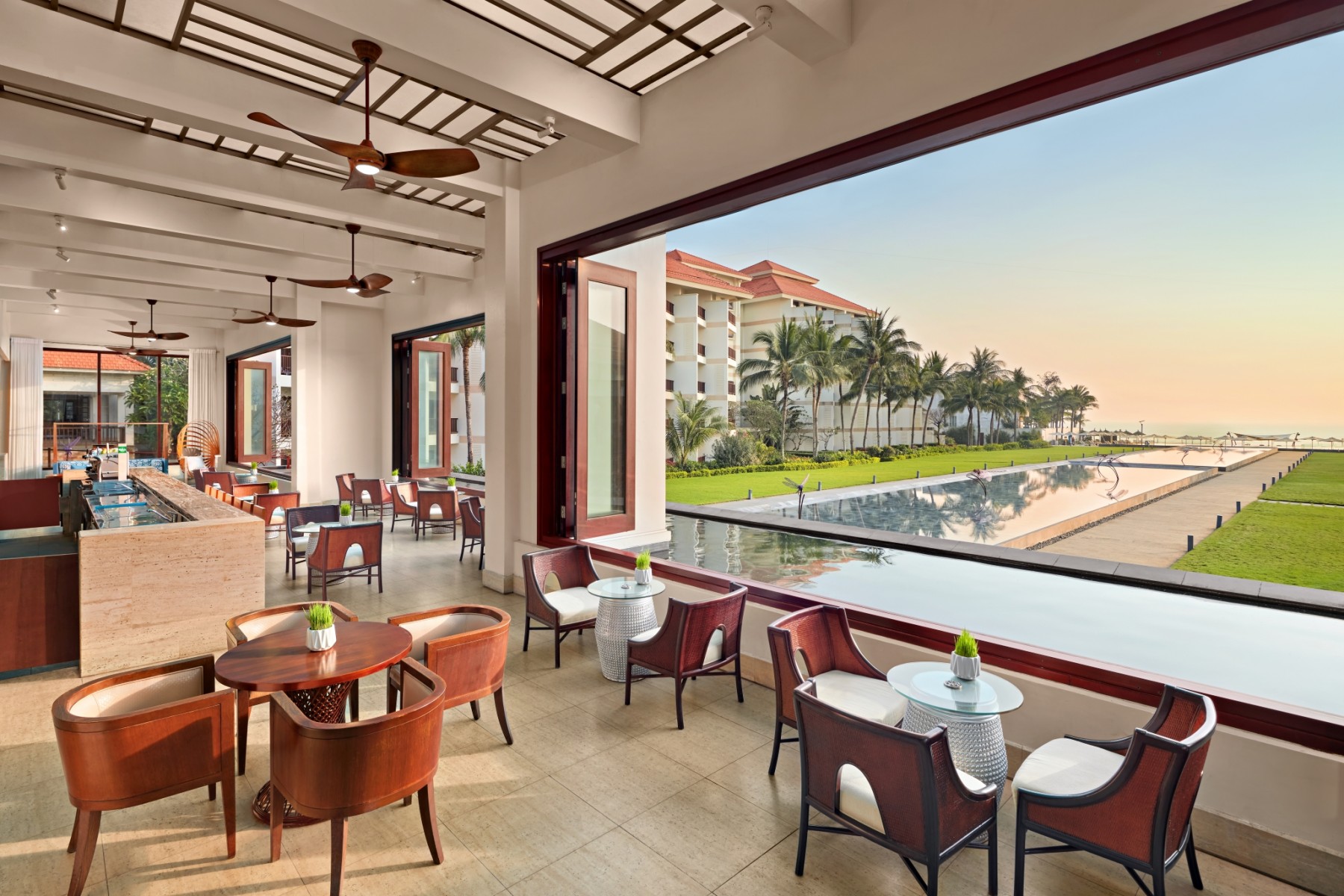 Infinity Bar overlooking the infinity pool and Bac My An Beach at Pullman Danang Beach Resort